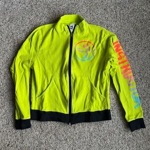 Zumba Fitness Neon Lime Zip Hoodie with Multicolor Smile and Sleeve Text